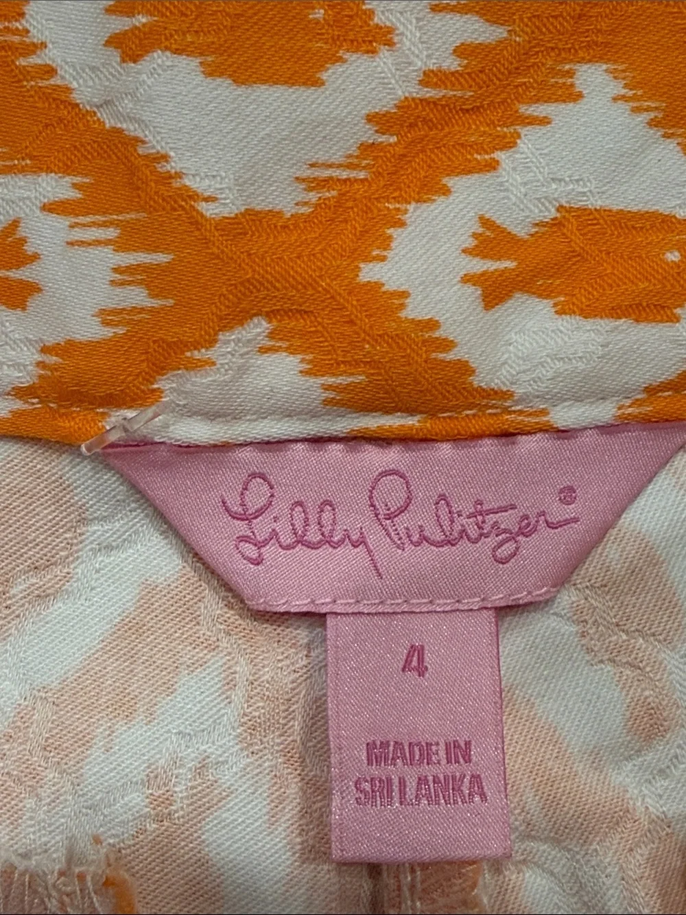 Lilly Pulitzer orange and white fish print Ellie shorts size 4 .